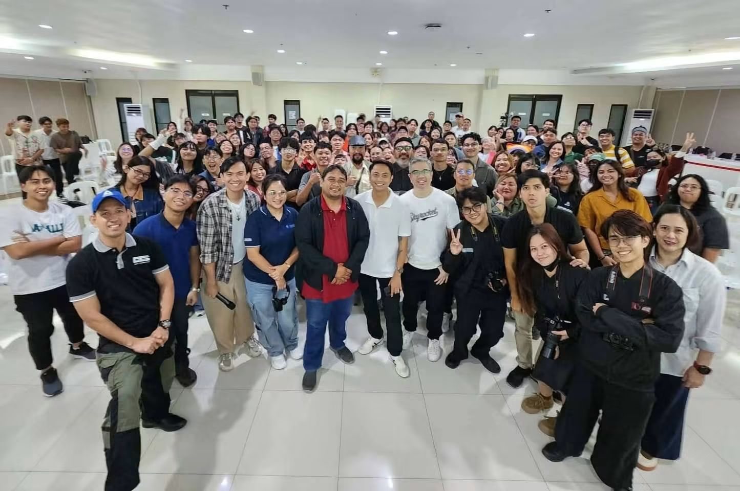 Crew with a full room of event attendees